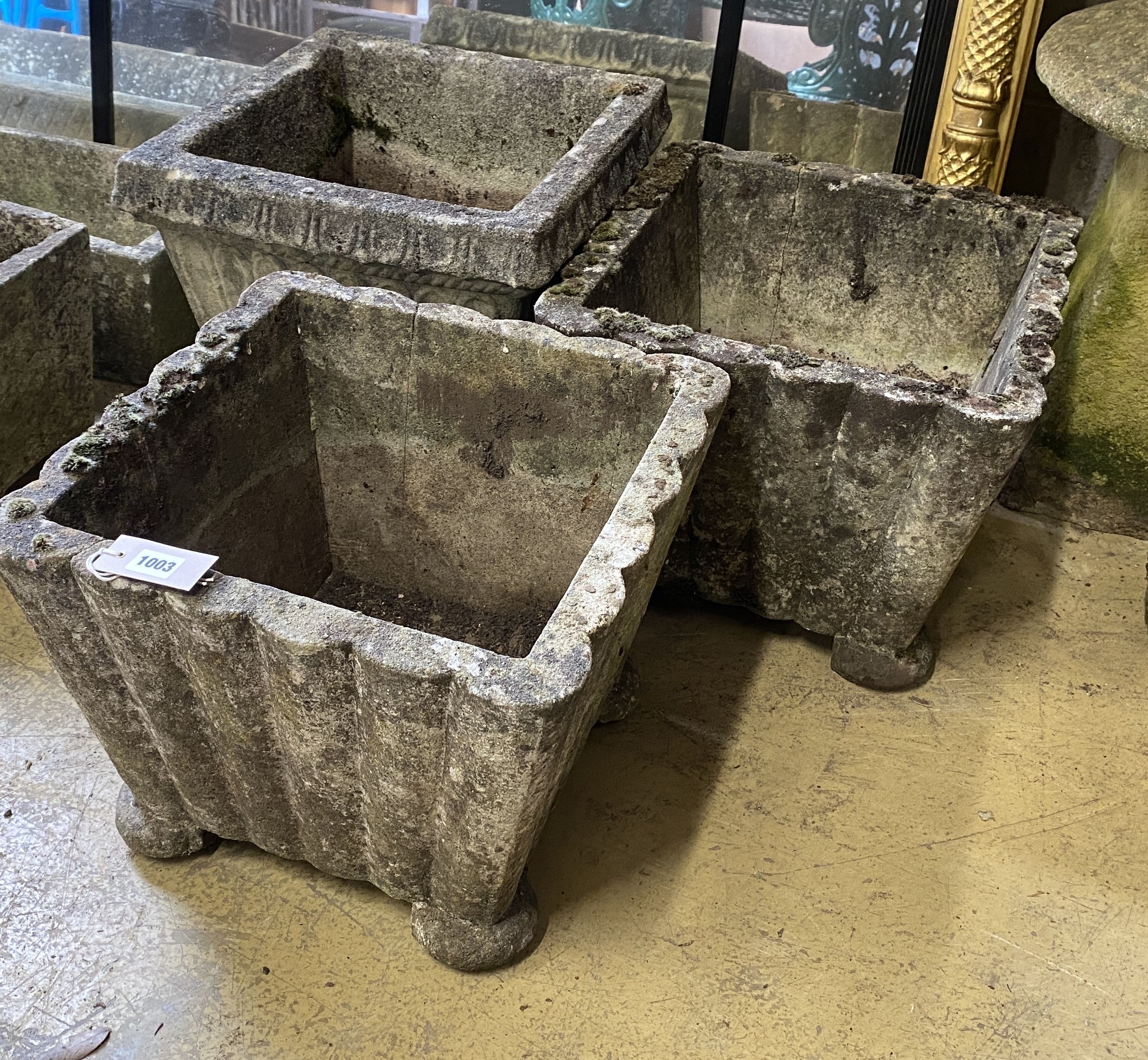 Three (two plus one) square reconstituted stone garden planters, largest width 40cm, height 37cm